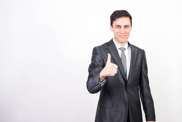 Satisfied man in suit. White background, Medium shot - Photo, Image