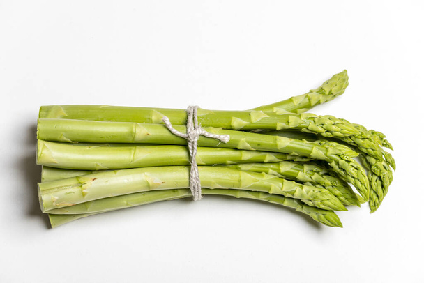 closeup of raw green asparagus - Фото, изображение