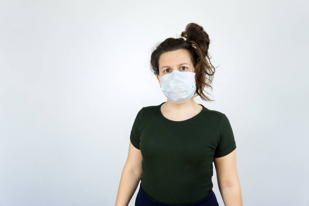 Woman wear protective face mask at home - protection against influenza virus.. Stop the virus and epidemic diseases. - Foto, Imagem