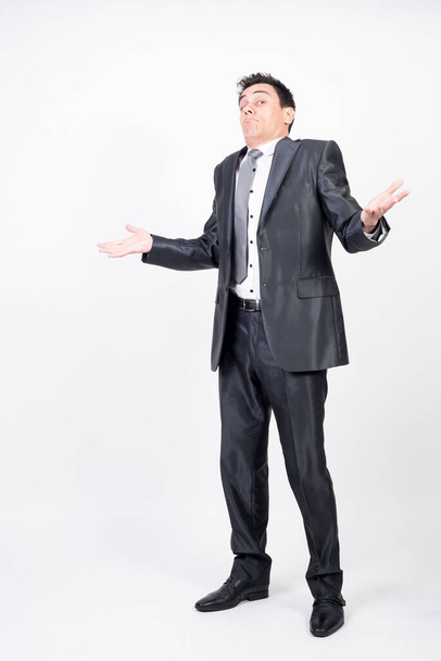 Resigned Man in suit. White background, full body - Фото, зображення