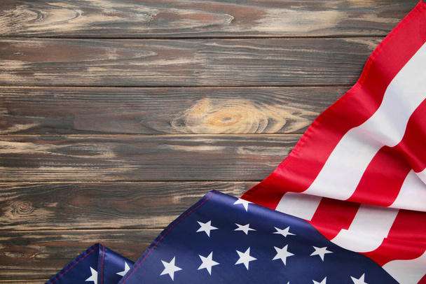 American flag on brown wooden background. Independence day - Foto, Imagem