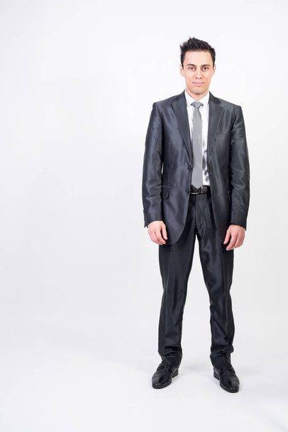 Smiling and happy man in suit. White background, full body - Photo, Image