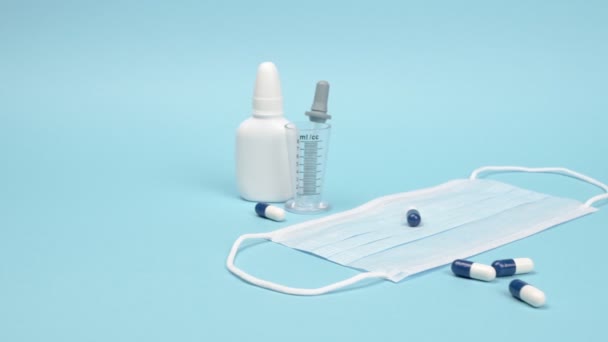 Medical accessories and medicines on a blue background. - Footage, Video