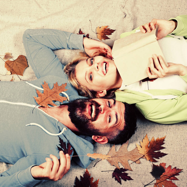 Autumn Leaves Festival. Autumn woman and happy man on Autumn background. I love you very much. Leaf fall design. Black friday sale. - Фото, изображение