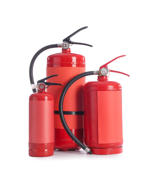 Fire extinguishers on white background - 写真・画像