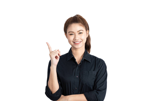 Beautiful Asian Business woman smile and pointing to copy space and thinking get idea with her business start up feeling so happiness and cheerful,Isolate on white background,Business Start up concept - Fotó, kép