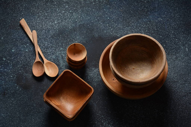Culinary background emty ceramic plates, wooden or bamboo spoons and bowls. Rustic style. Home Kitchen Decor - Valokuva, kuva