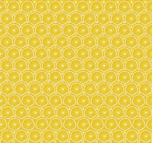 Текстура нарізаних шматочків апельсина на жовтому фоні. Нарізати шматочки апельсина. Здоровий спосіб життя. Здорове харчування. Свіжі фрукти
 - Фото, зображення