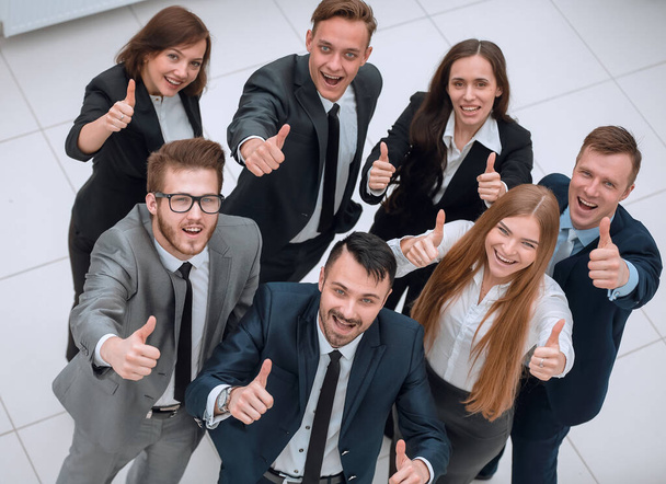 successful business team holding up a thumbs up - Photo, Image