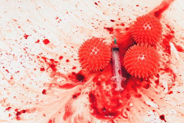Splashes of blood dripping into the sink in the bathroom. red virus molecules syringe - 写真・画像