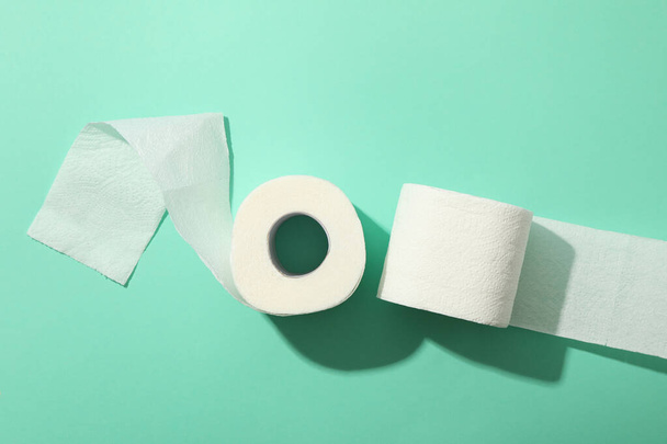 Toilet paper on mint background, top view - Photo, Image