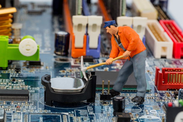 Computer board and construction workers - 写真・画像