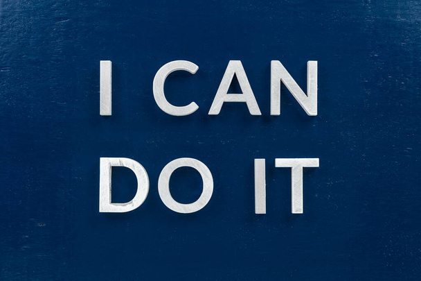 слова i can do it laid with white metal letters on dark blue flat background
. - Фото, изображение