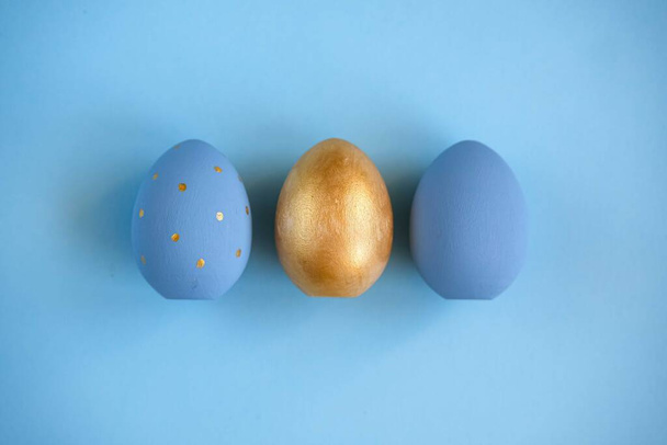 Gold und hellblaue Eier - Foto, Bild