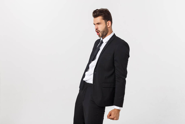 Portrait of confident mature businessman in formals standing isolated over white background - Photo, Image
