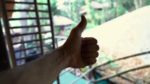 man giving a finger thumb up gesture. - Footage, Video