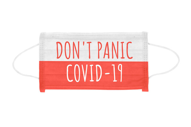 PP non-woven disposable medical face mask isolated on white background. Don't panic lettering on medical mask toned in poland flag colors - Photo, Image