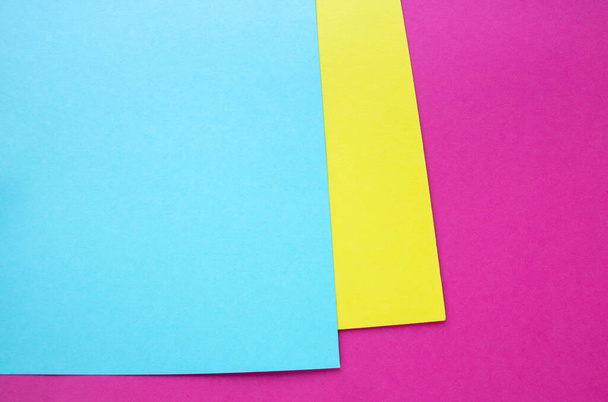 roze en gele pastel papier kleur voor textuur achtergrond. - Foto, afbeelding