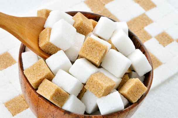 коричневі та білі кубики цукру
 - Фото, зображення
