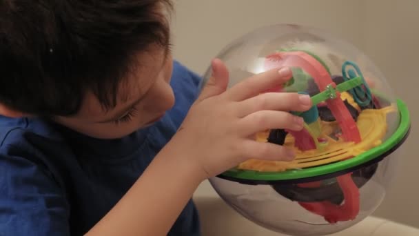 preschooler boy plays with puzzle game - Footage, Video