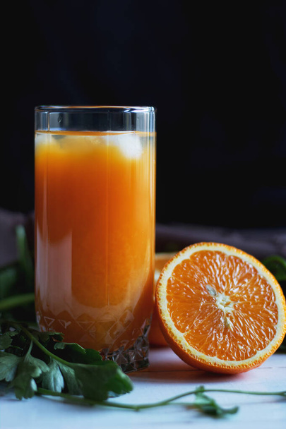 glass of orange juice with ice - Fotó, kép