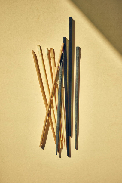 set of Chinese chopsticks on a wooden background - Fotografie, Obrázek