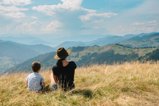 mother and son having rest on vacation in mountains - Foto, Imagen