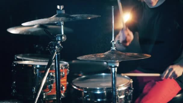 One drummer rehearsing in a studio. Drummer, drumset, drums in slow motion - Кадры, видео