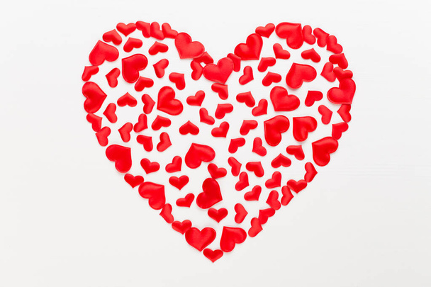 Valentines day background red hearts on white wooden background.Greeting card. - Фото, зображення