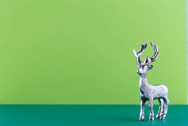 Christmas reindeer on pastel color background. Christmas or New Year minimal concept. - Foto, immagini