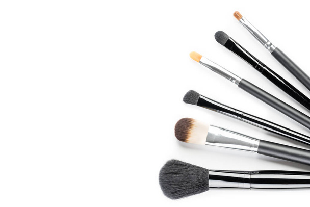 Different makeup brushes were photographed against a white background - Photo, Image