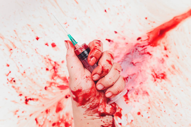 Bloody in sink with flowing red blood. Murder concept background. syringe - Φωτογραφία, εικόνα