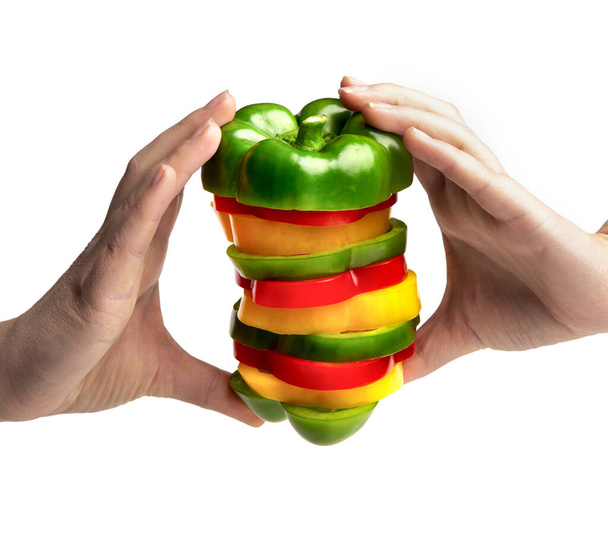 Fresco hamburger colorato di paprica in mani isolate su bianco
 - Foto, immagini