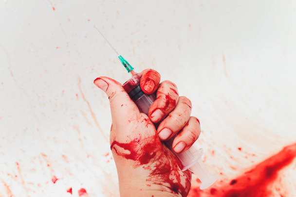 Bloody in sink with flowing red blood. Murder concept background. syringe - Photo, Image