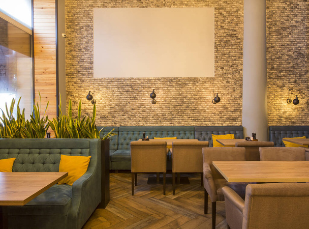 Restaurant in a modern style with textured walls - 写真・画像