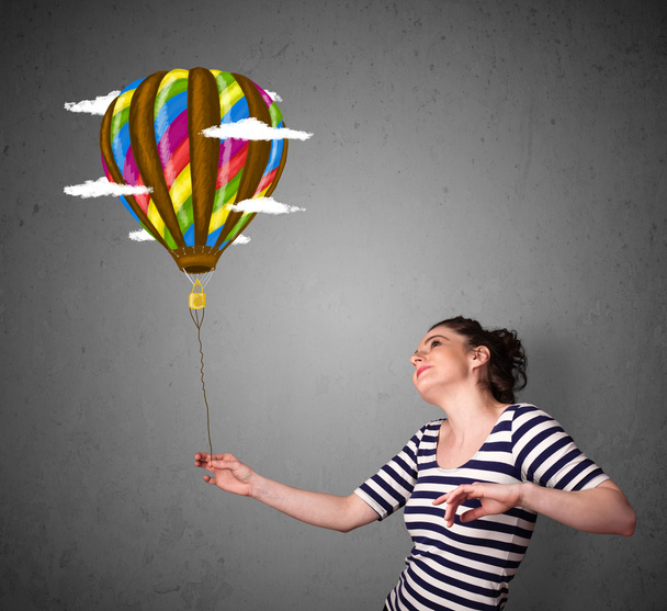 Woman holding a balloon drawing - Photo, image