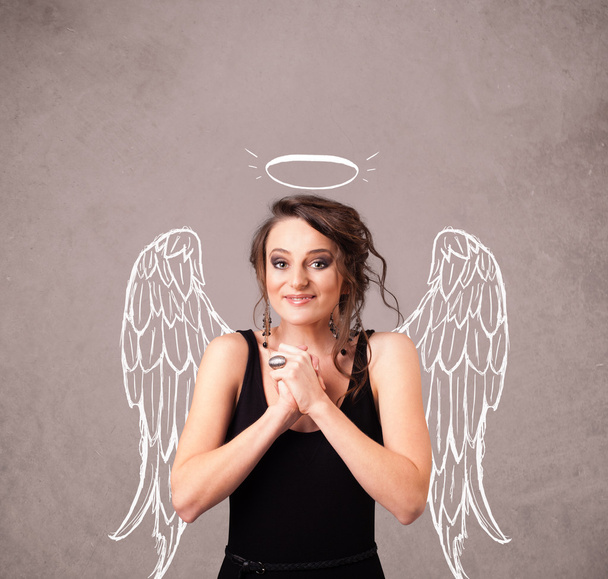 Cute girl with angel illustrated wings - Фото, зображення