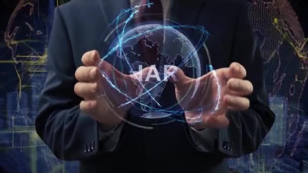 Miehen kädet aktivoi hologrammi Jaa
 - Materiaali, video