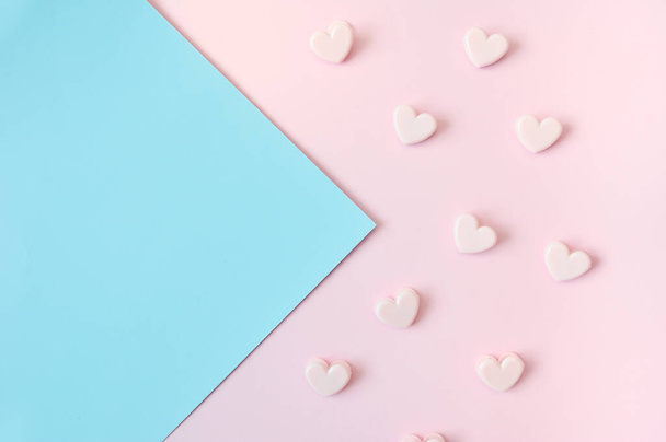 Mockup Happy Valentines Day or Mothers Day concept. Pink hearts on a pink and blue background with place for your text. For greeting card, banner, poster or web. - Foto, Bild