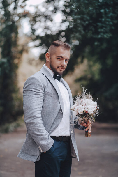 Handsome groom waiting for bride   - Photo, Image