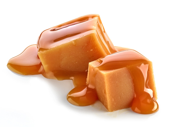 two caramel pieces isolated on white background - Photo, Image