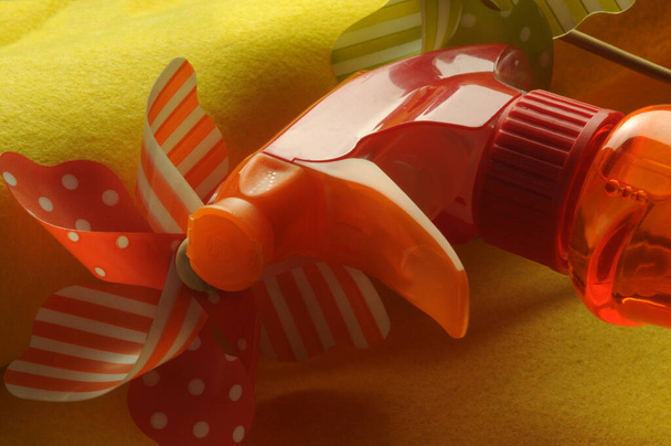 Bottle of detergent with pinwheel - Fotó, kép
