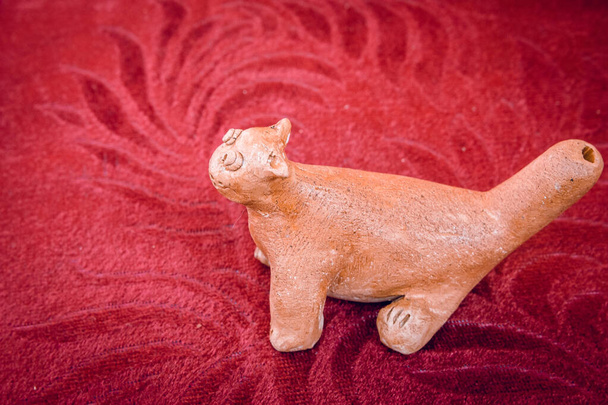 Cat. Ceramics, children's toy whistle. Handmade. Handwork, hobbies, crafts. - Photo, Image