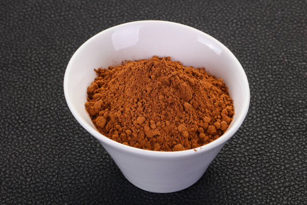 Какао-порошок в мисці готовий до приготування
 - Фото, зображення
