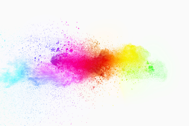 Kleurrijke poeder explosie op witte achtergrond. Pastel kleur stof deeltje spatten. - Foto, afbeelding