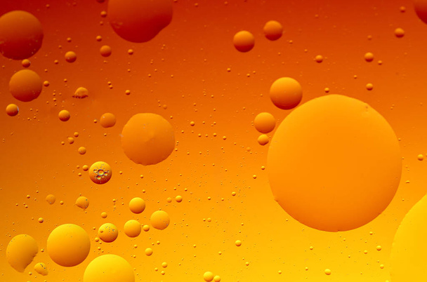 Bright abstract, yellow background with flying bubbles and copy space - Fotoğraf, Görsel