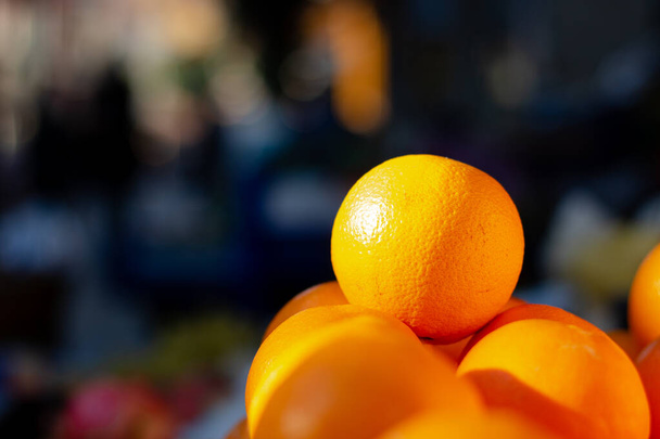 Oranges on the stand - Φωτογραφία, εικόνα