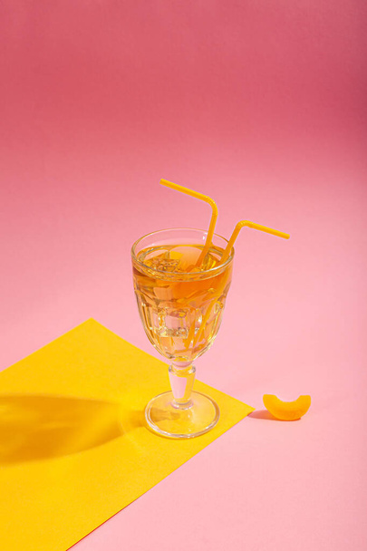 Green tea with ice on a pink background. Concept - Valokuva, kuva