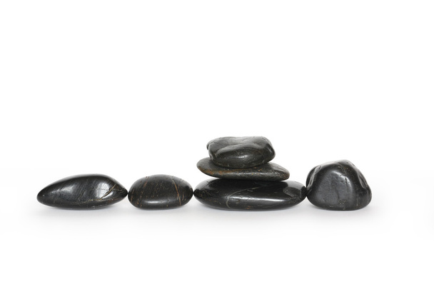 Pedras pretas em branco
 - Foto, Imagem