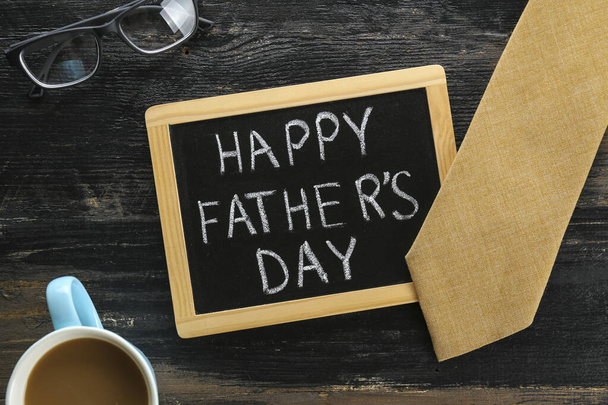 Father's day greeting card concept. Close up composition with symbolic objects on textured background with a lot of copy space for text. Top view, flat lay. - Foto, Imagem
